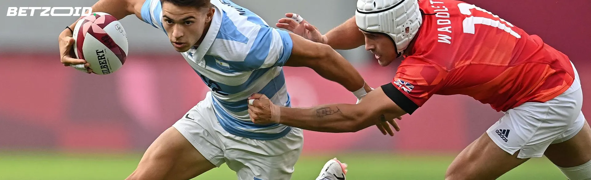 Giocatori di rugby in azione durante una partita.