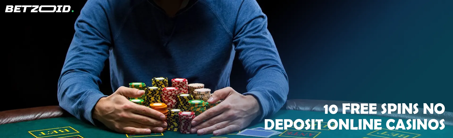 A player is holding a pile of chips on a casino table.