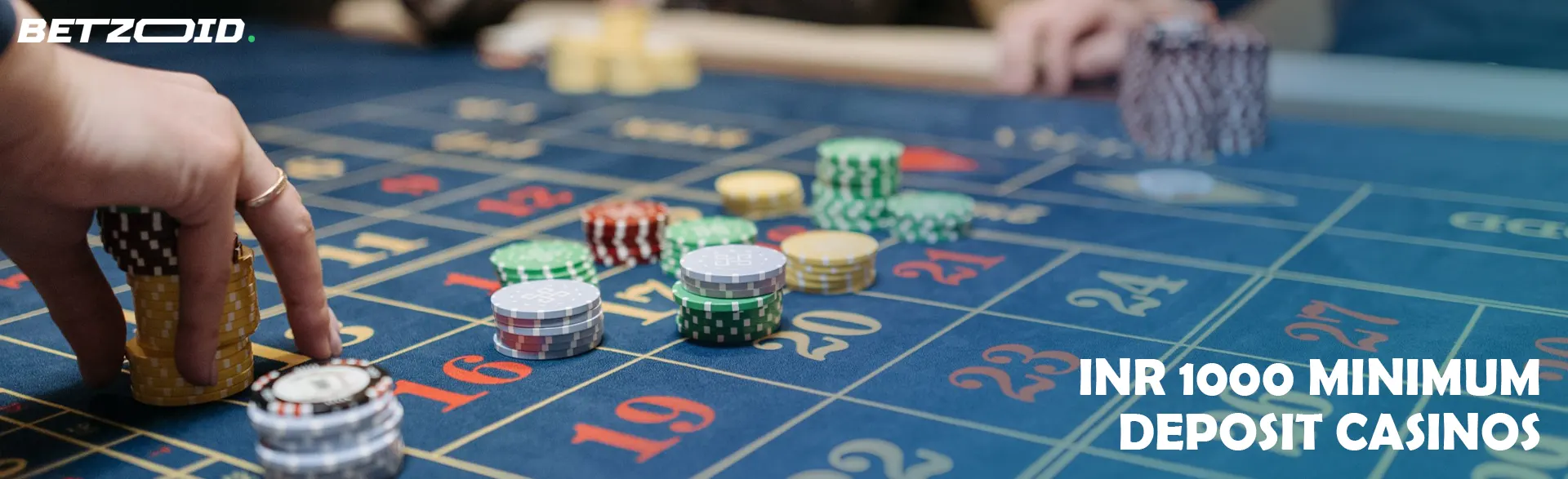 The player places chips on the casino table.