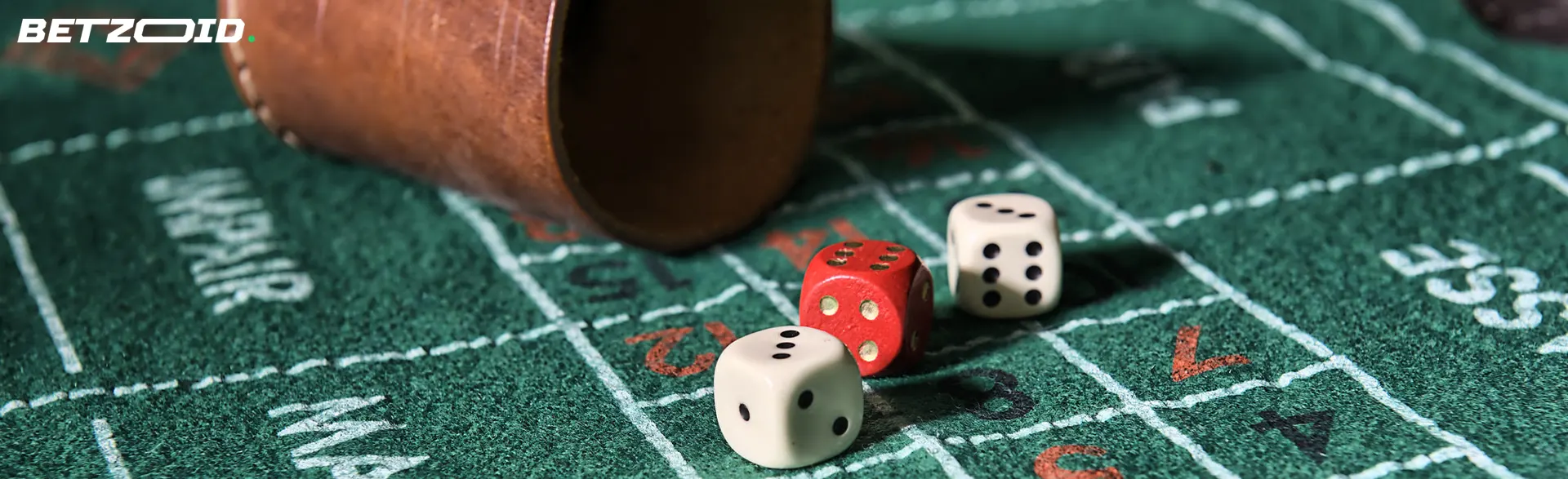 Dice next to the bowl for throwing them.