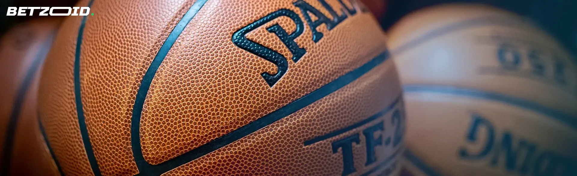 Close-up of a basketball with the Spalding logo visible.