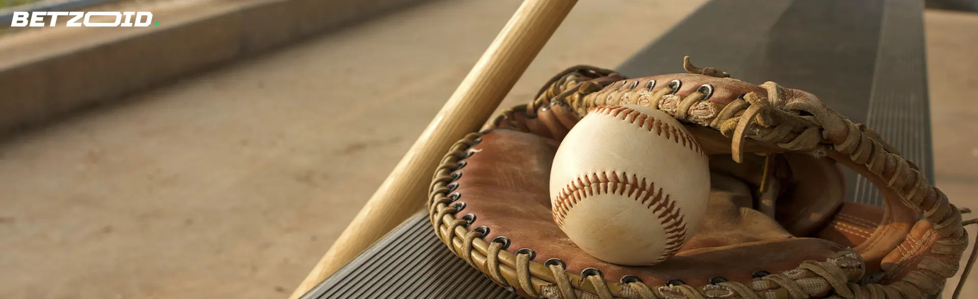 Baseball ball, glove and bat.