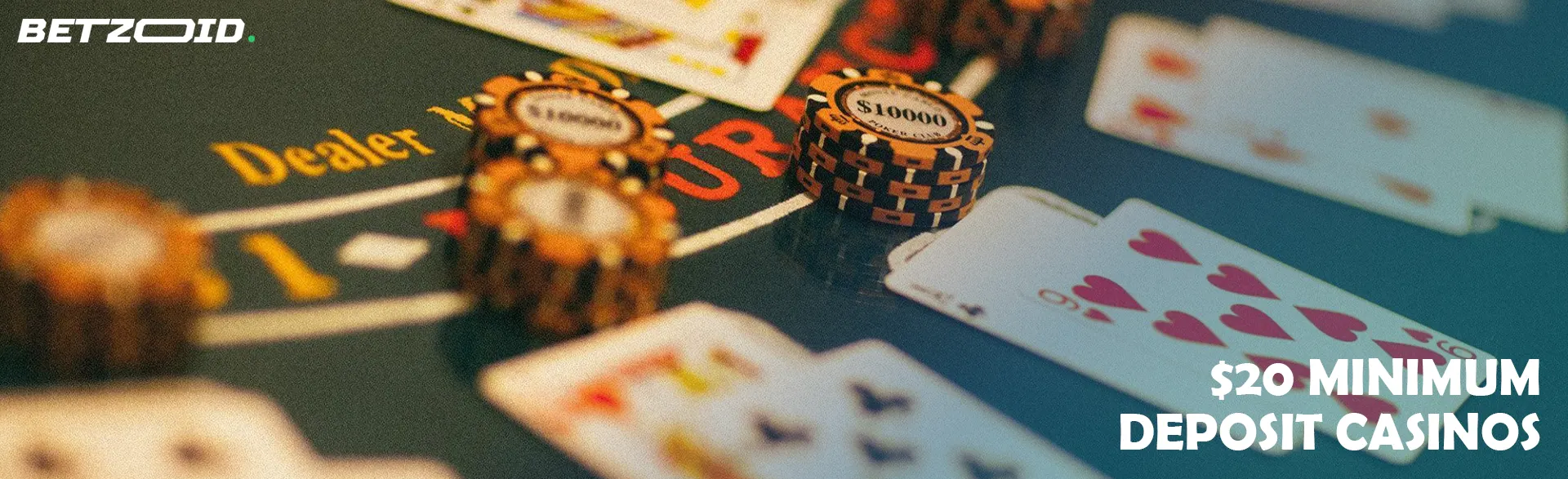 Cards and chips on the casino table.