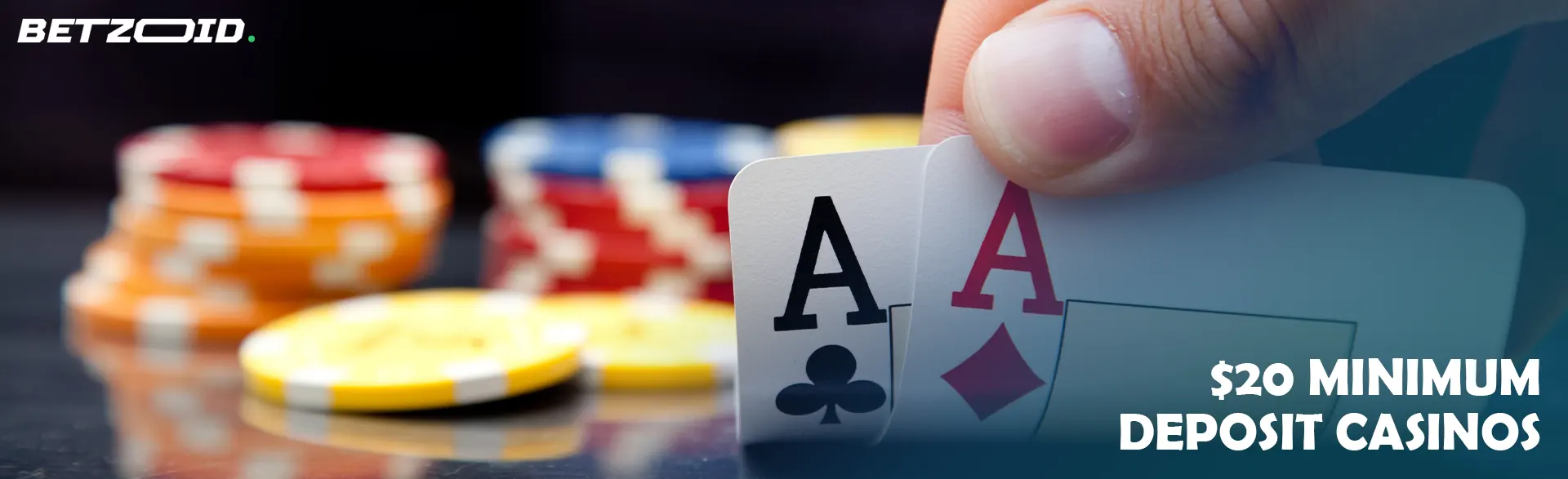 The player holds cards on the background of casino chips.