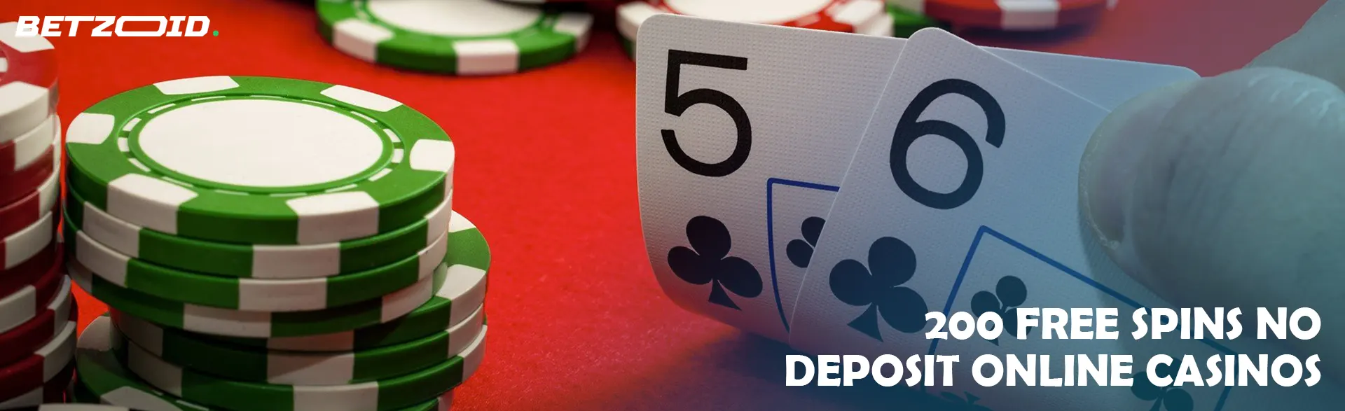 The player holds the cards next to the casino chips.