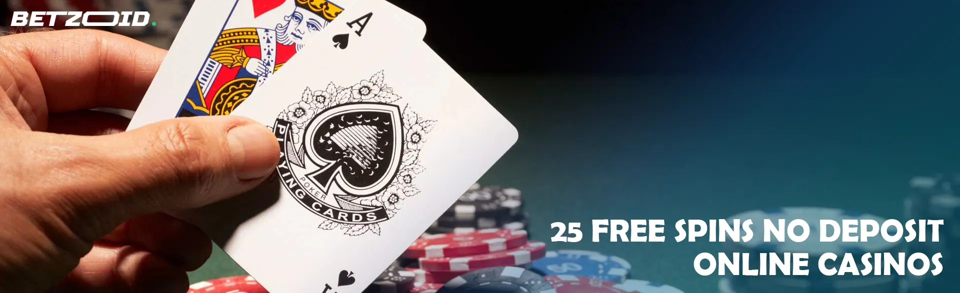 Two cards in hand on the background of casino chips.