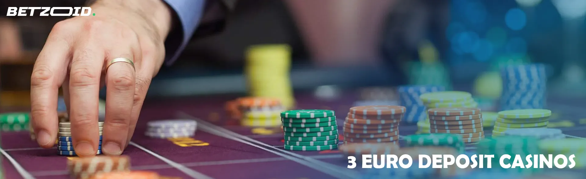 A player puts chips on the casino table.