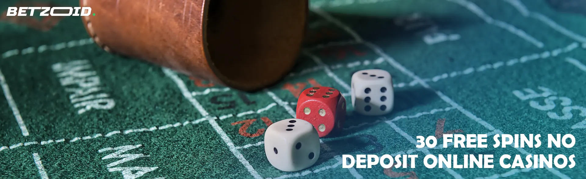 Dice next to the throwing bowl.