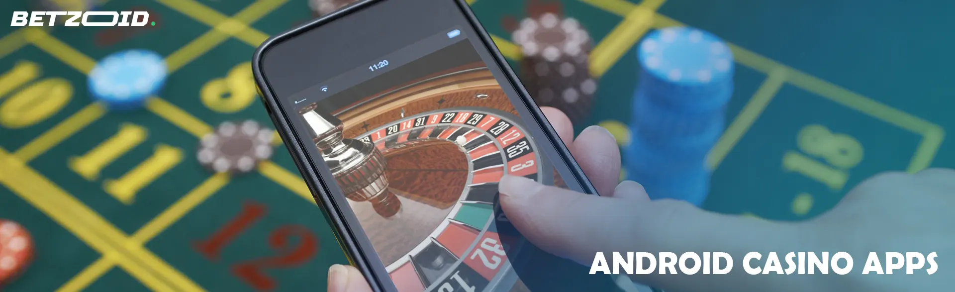 Roulette on the smartphone screen next to the gaming table.