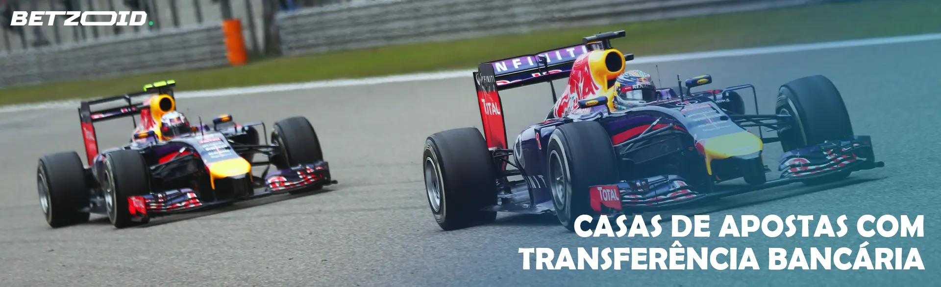 Carros de Fórmula 1 na pista durante a corrida.