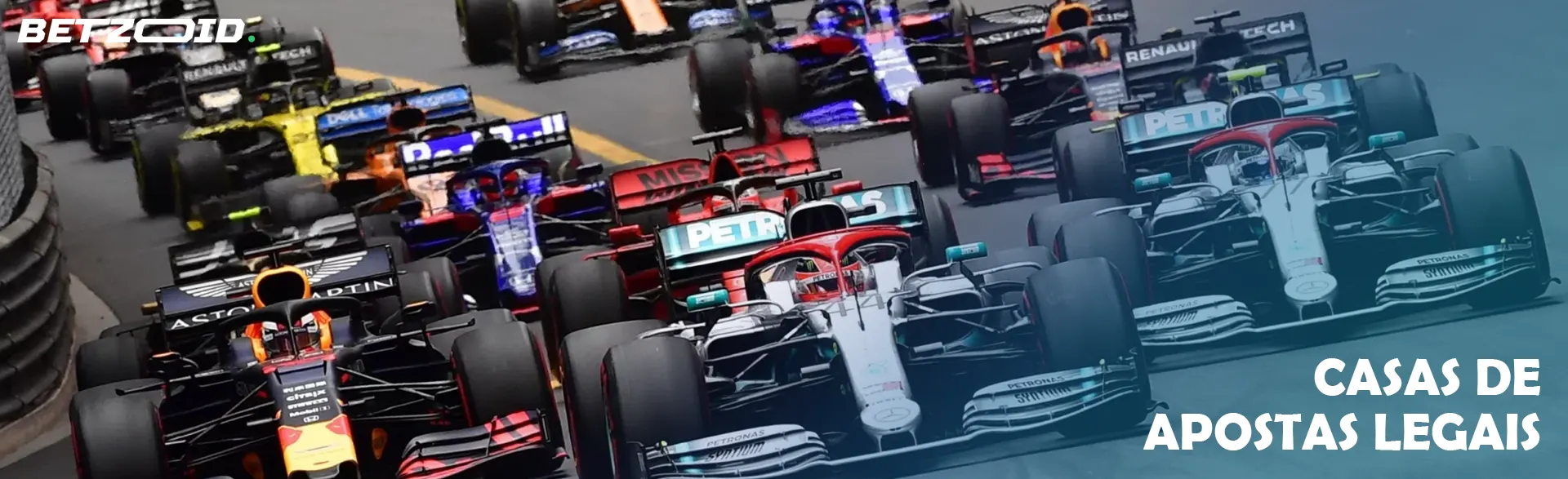 Carros de Fórmula 1 na pista.