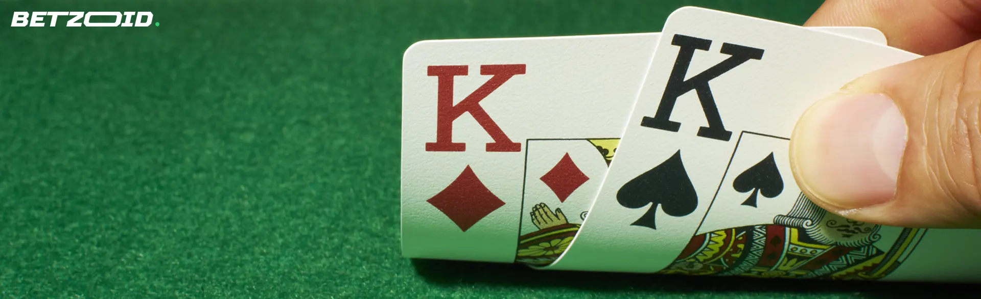 The player holds two playing cards.