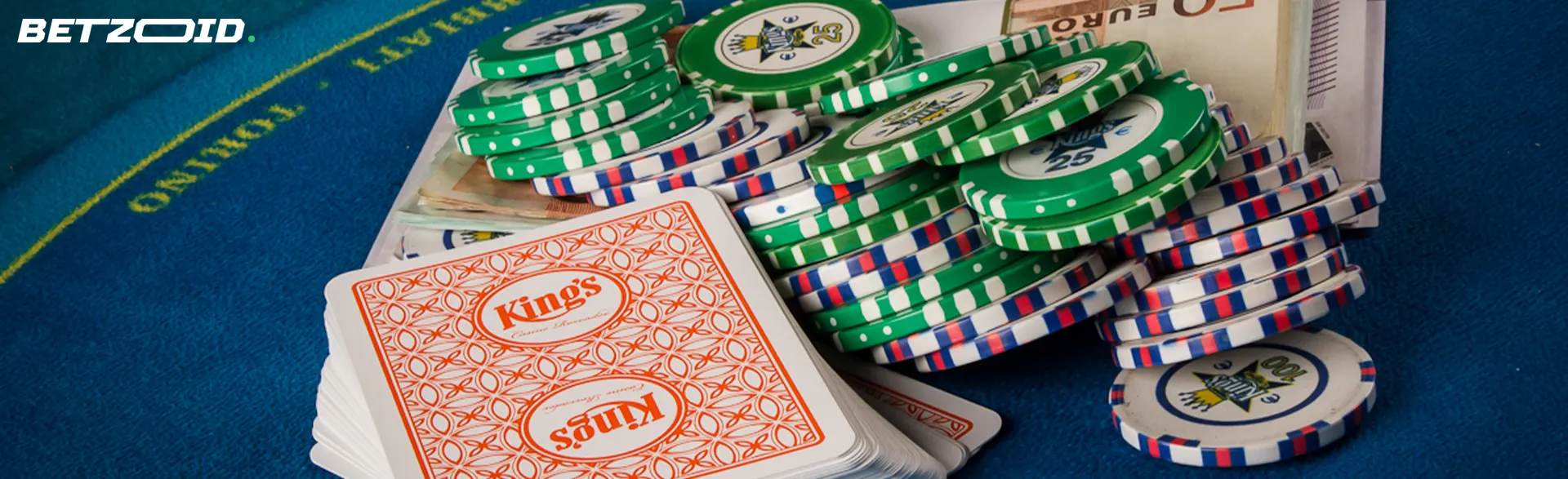 Chips and cards on the casino table.