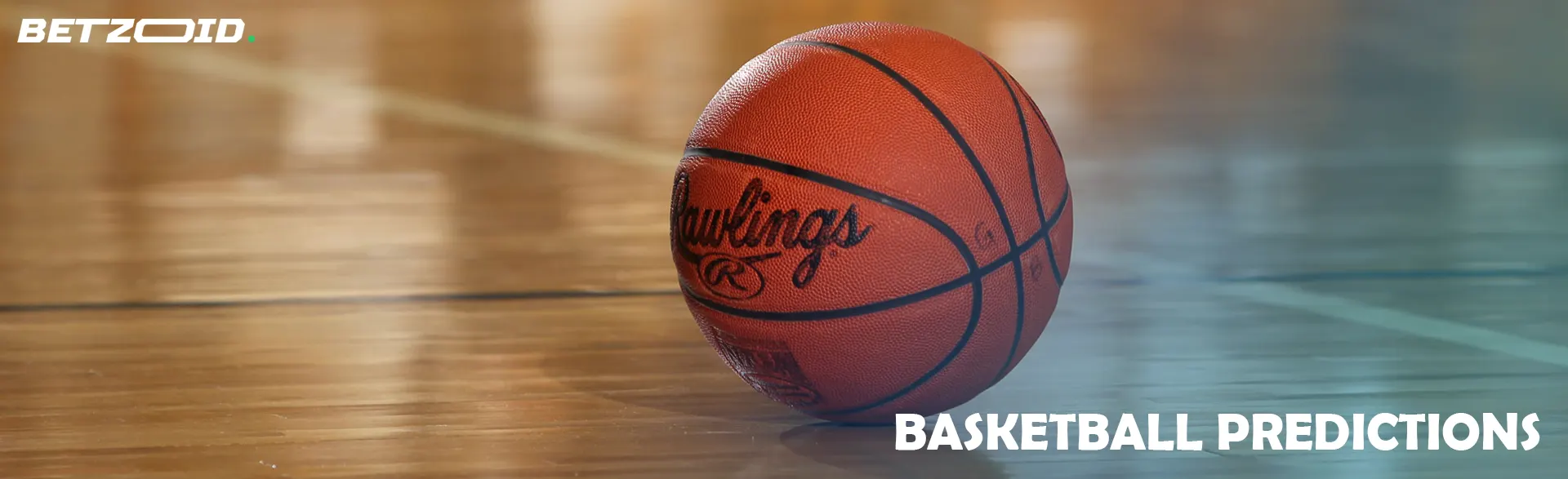 The basketball is lying on the floor.