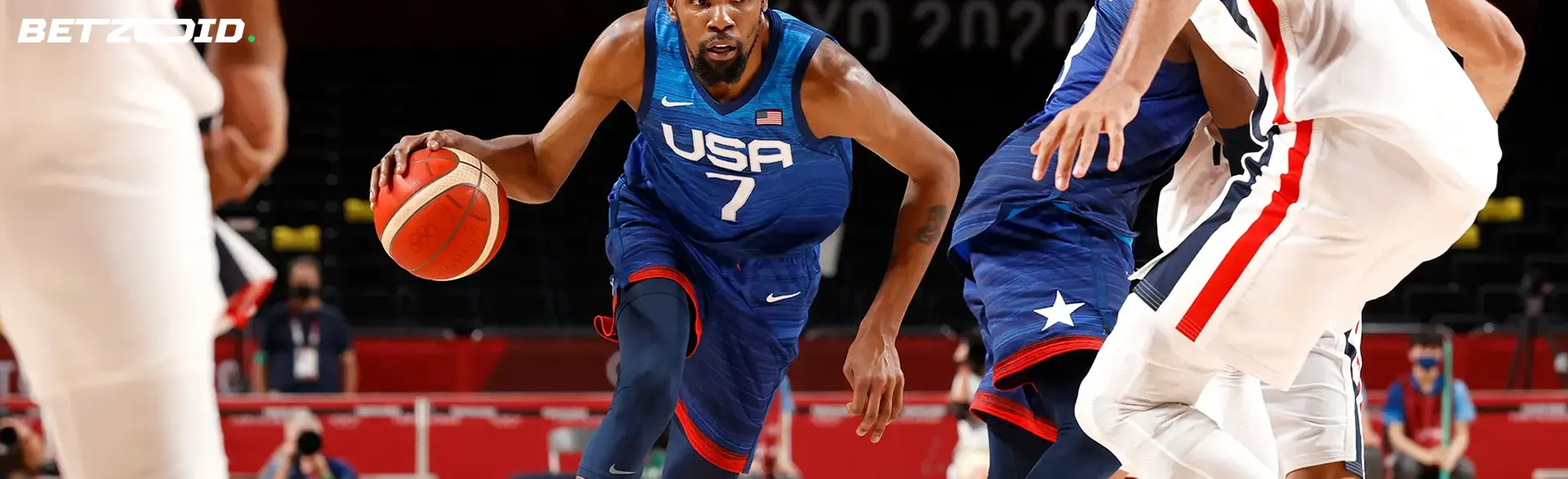 Basketball players in action during a match.