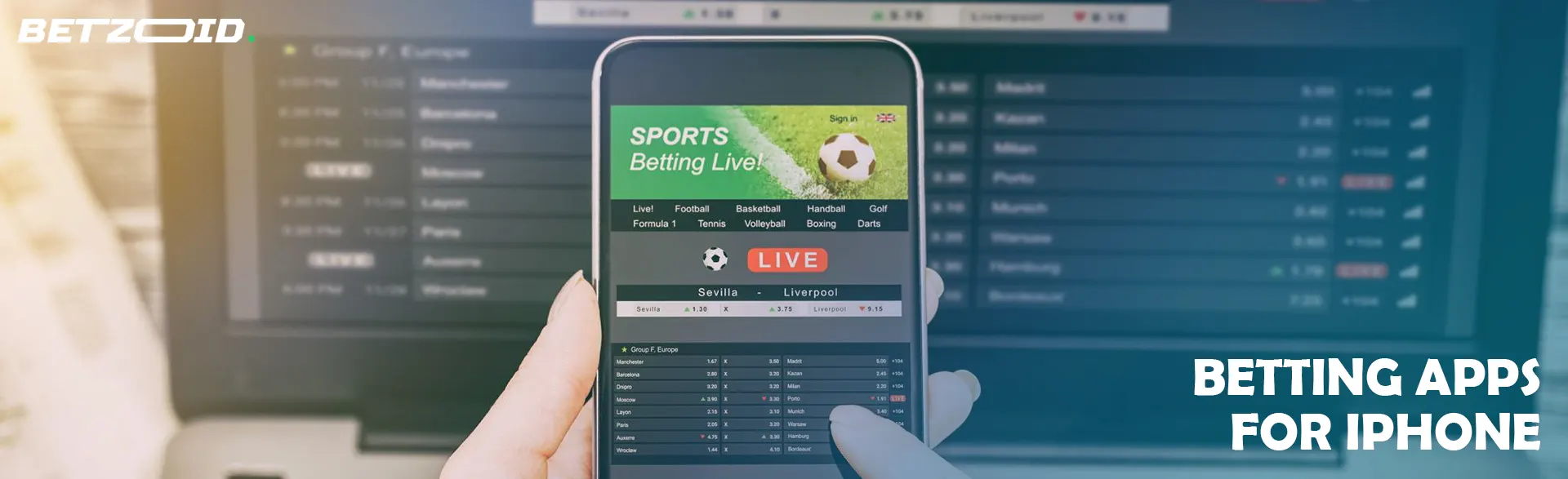A man is holding an iPhone with a betting application.