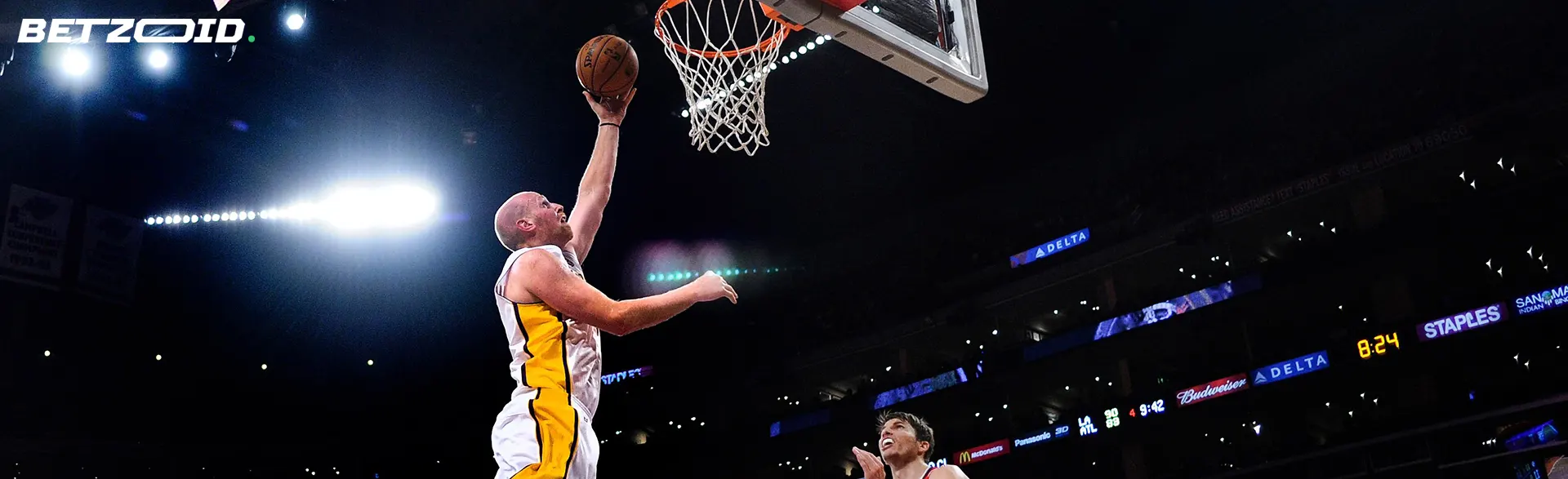 Basketball players in action during the game.