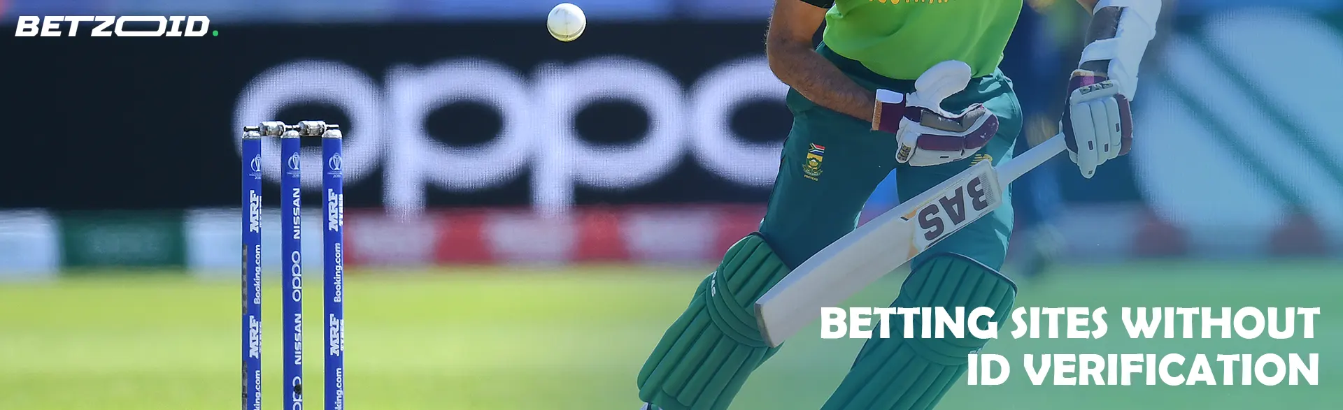 A cricketer prepares to hit during a match.