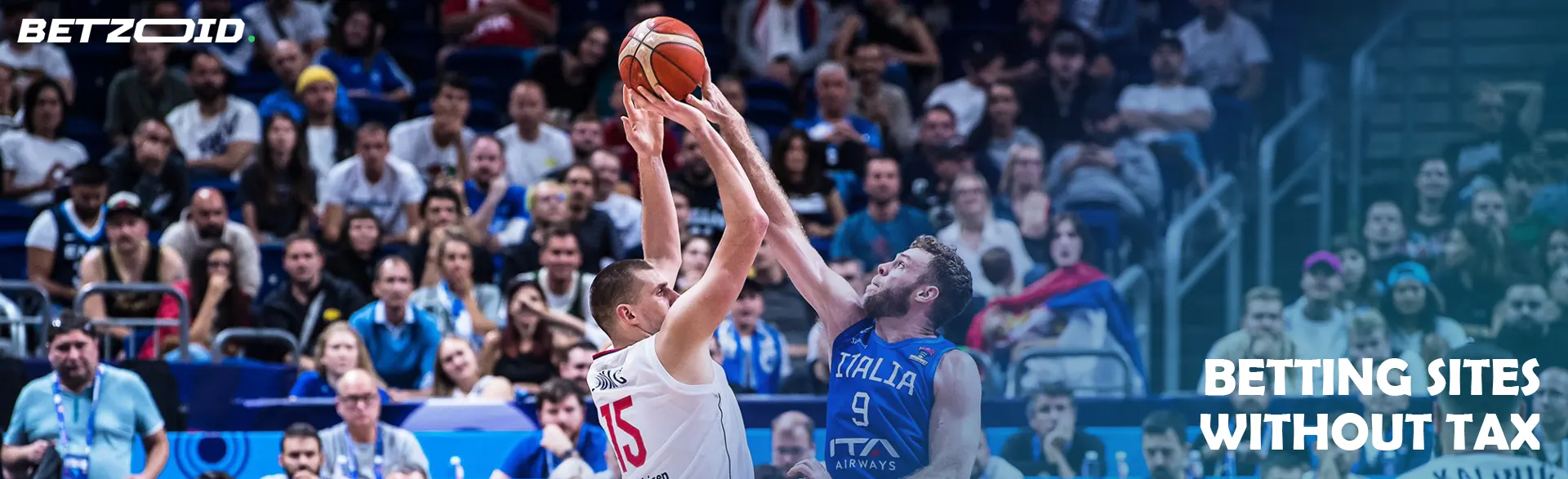 Players of national basketball teams compete for the ball.