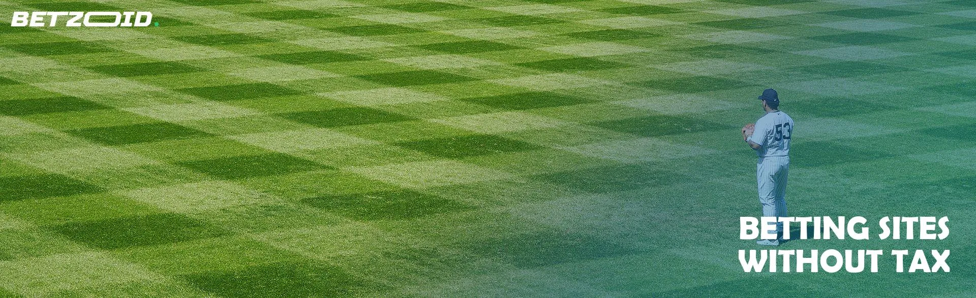 A baseball player stands on an empty field.
