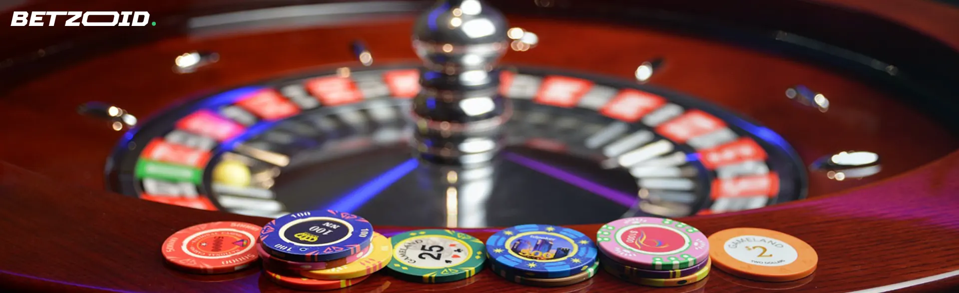 A vibrant roulette wheel with colorful chips placed on the edge of the table.