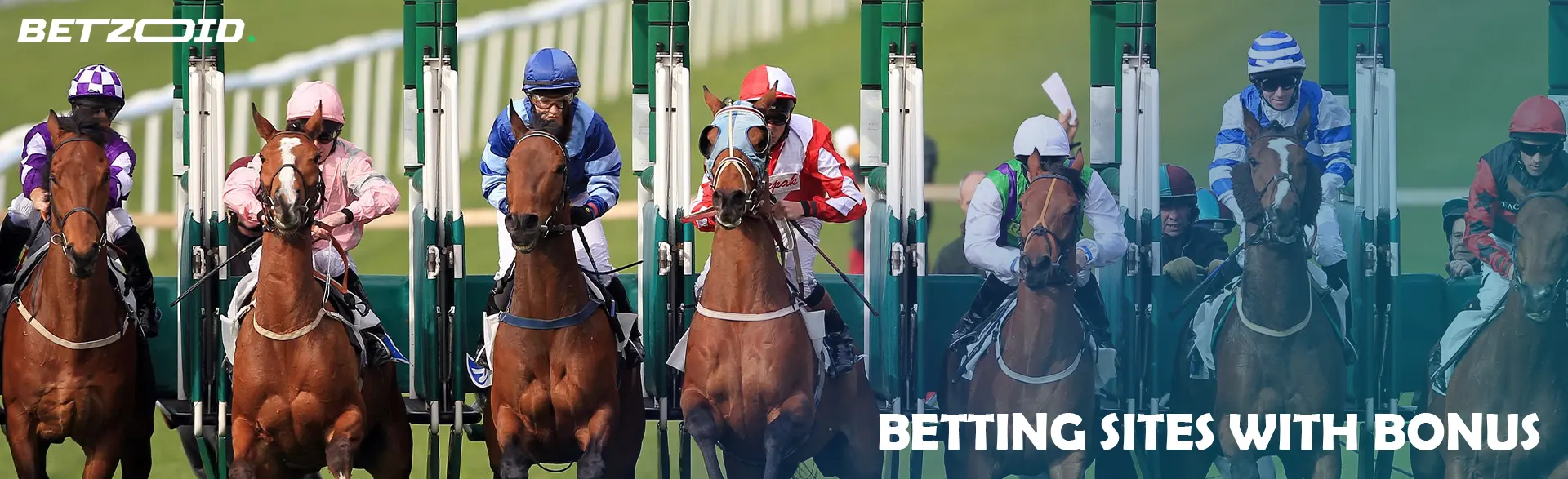 Jockeys on horses at the start of the race.