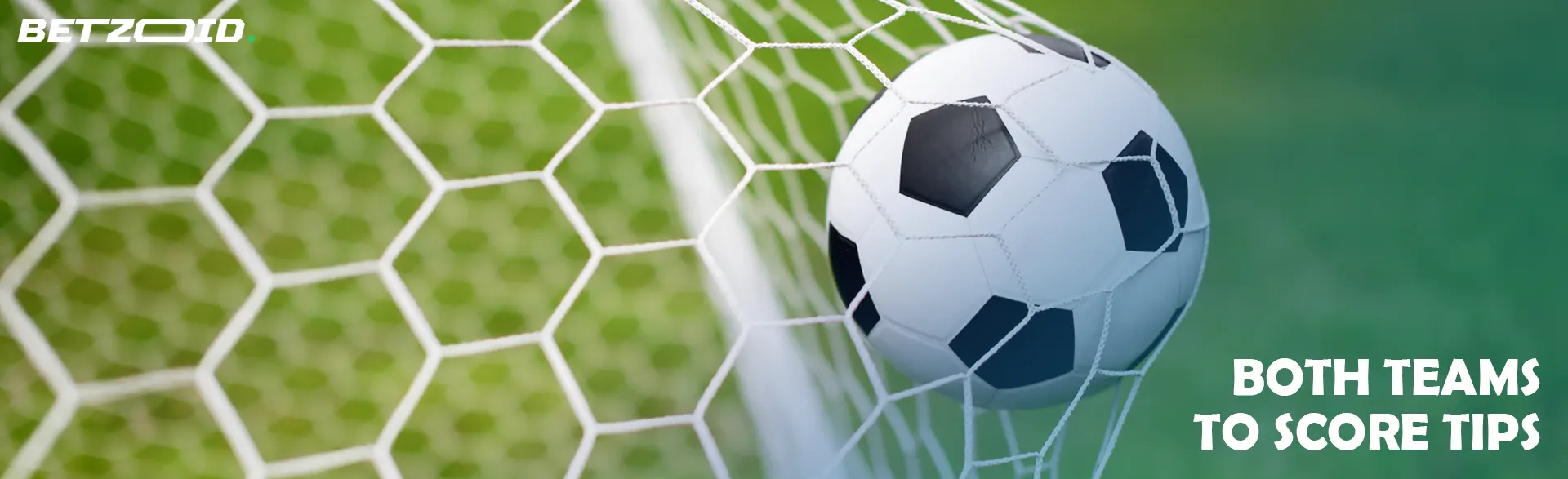 The ball in the soccer goal after a goal.