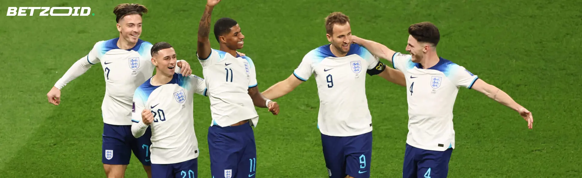 Football players rejoice on the field.