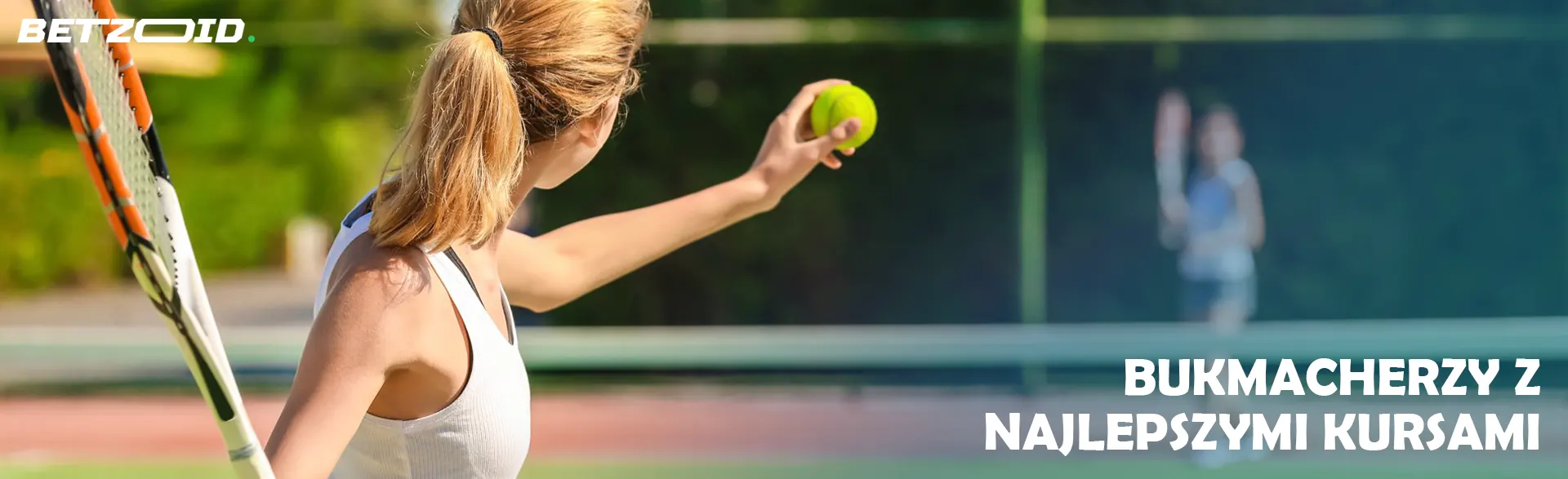 Tenisista uderzy piłkę.