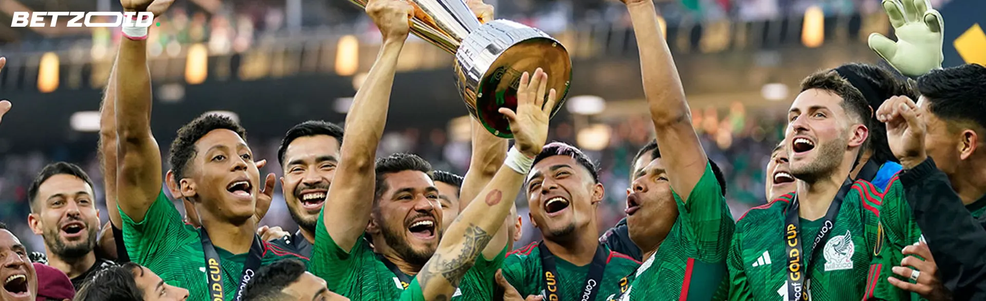 Los futbolistas celebran la victoria con un trofeo.