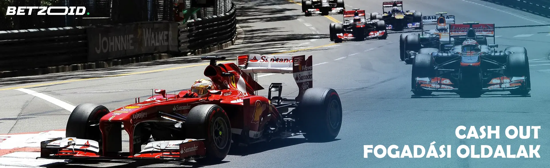 Forma-1-es autók a pályán egy verseny alatt.