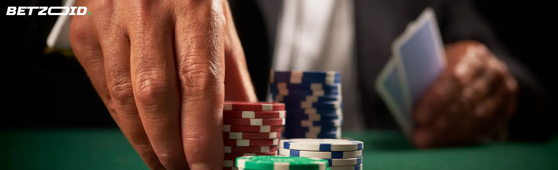 The player places chips on the casino table.