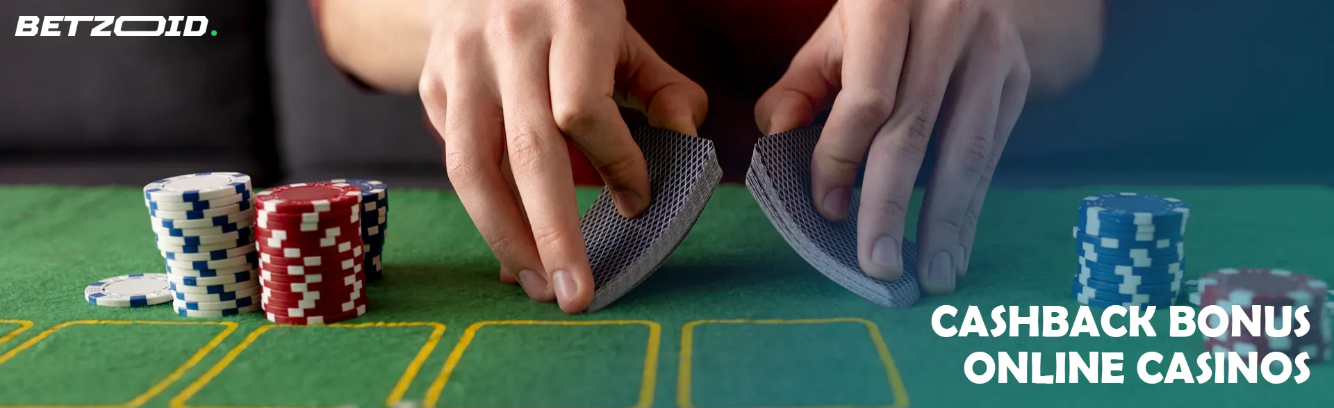 The player shuffles the cards next to the casino chips.