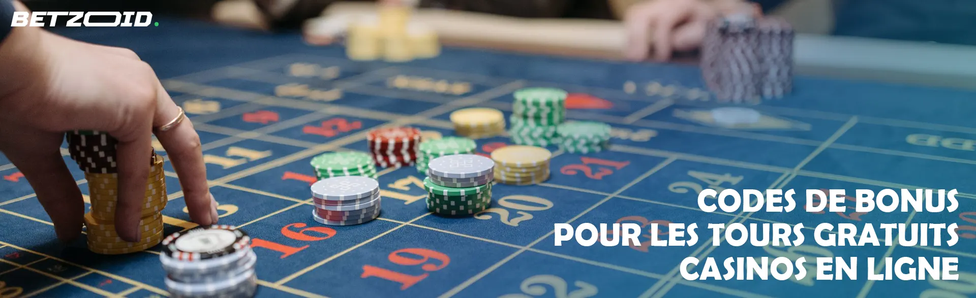 Le joueur place des jetons sur la table du casino.