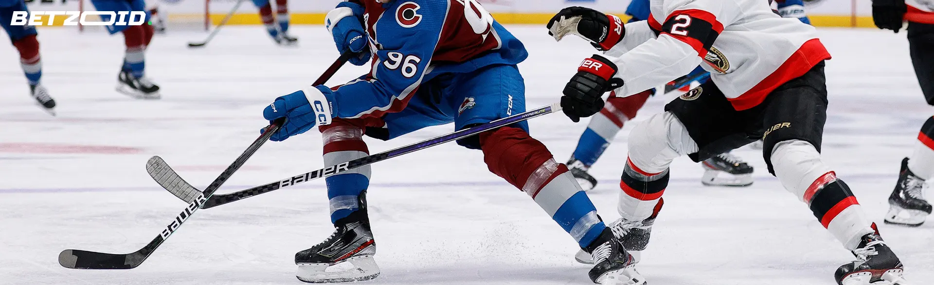 Hockey players in action during a match.