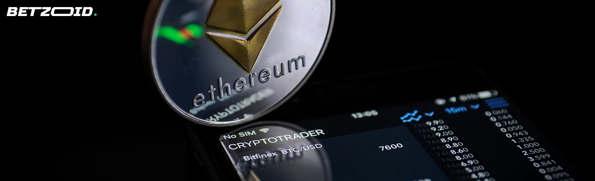 Ethereum cryptocurrency coin on smartphone screen.