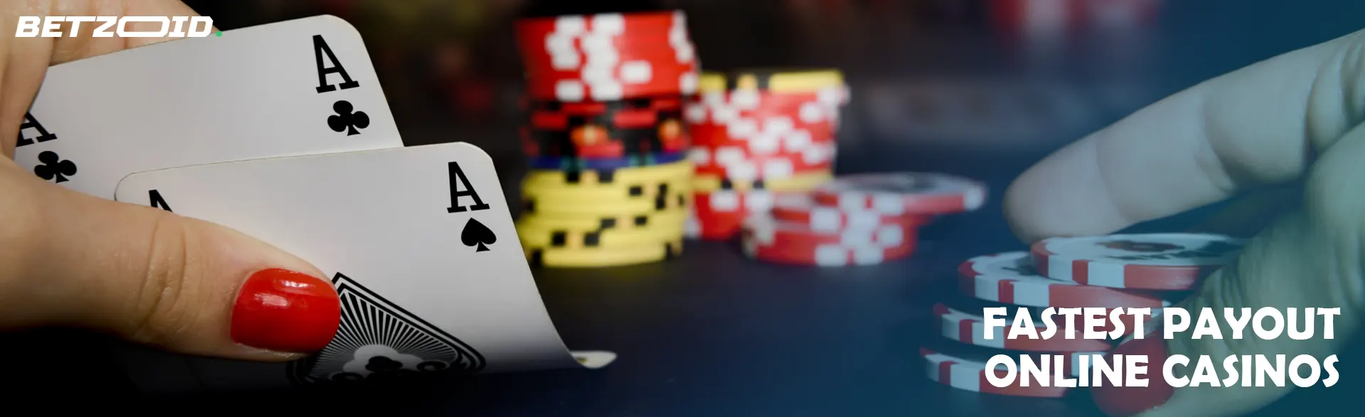 The player holds ace cards in his hand on a background of chips.