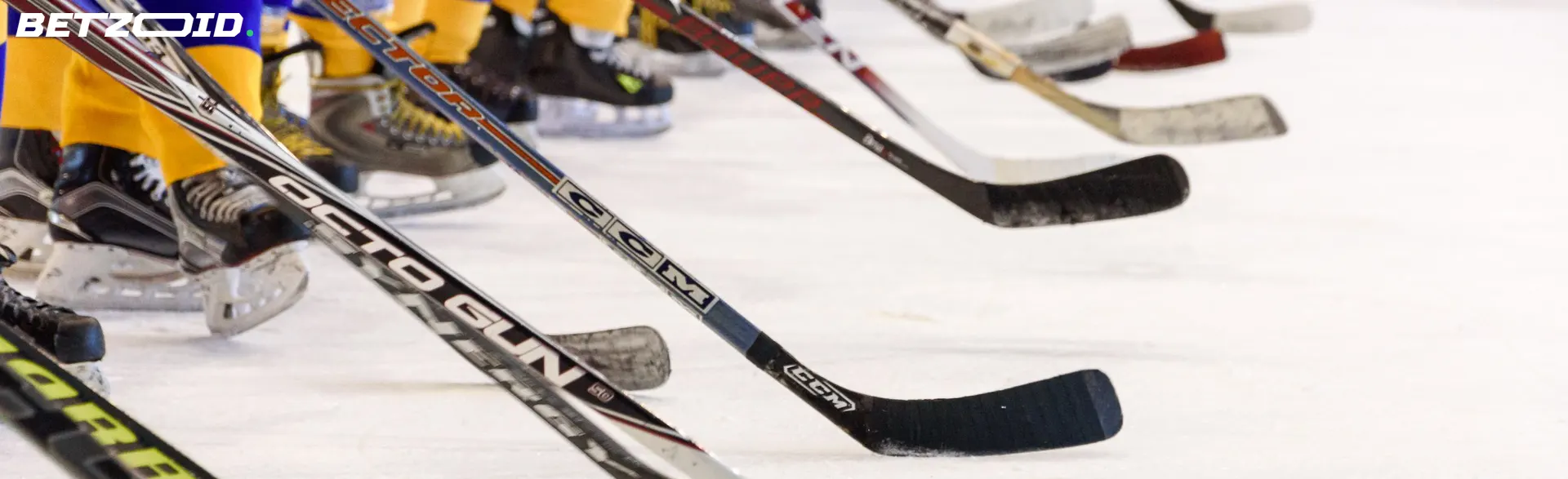 Hockey players lined up on ice, representing fastest payout sportsbooks in Canada.