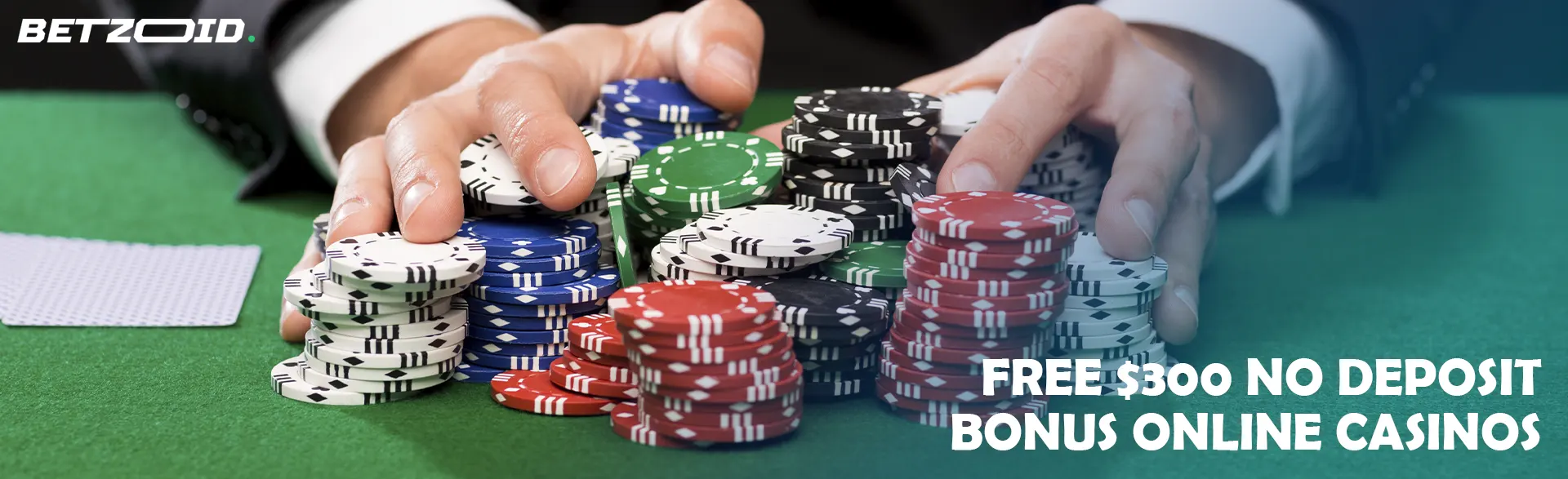 A player is holding a pile of chips on a casino table.