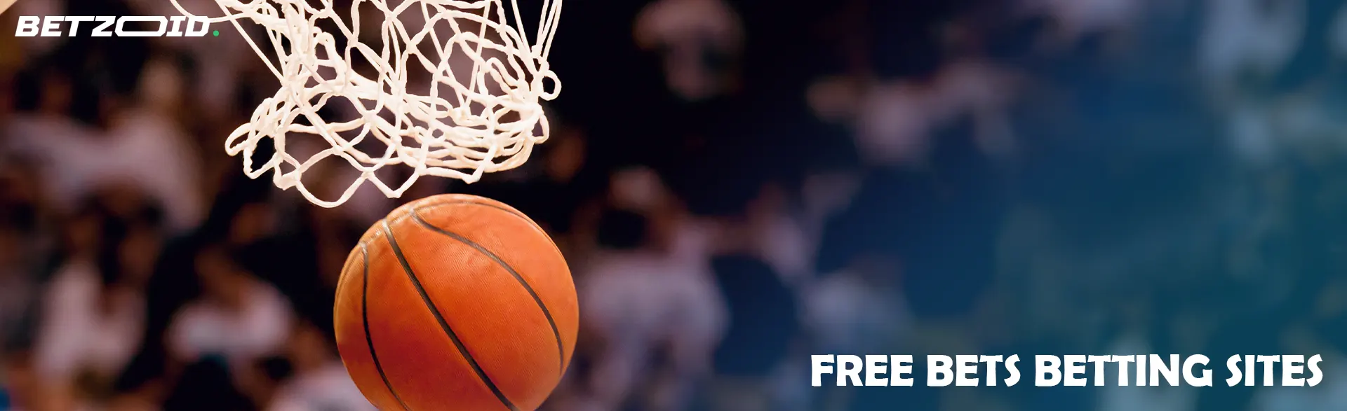 The basketball flies into the basket through the net.