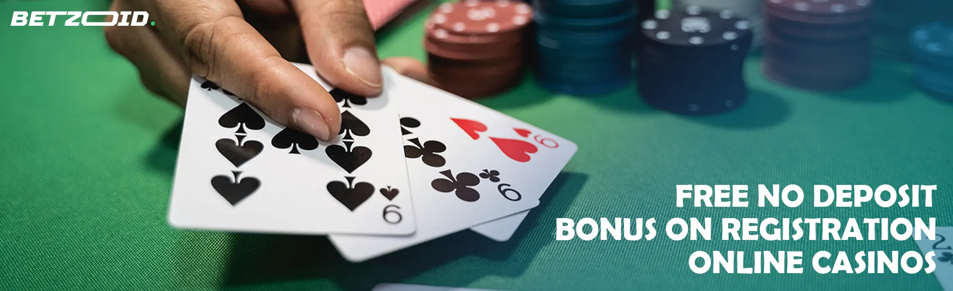 The player holds the cards next to the casino chips.