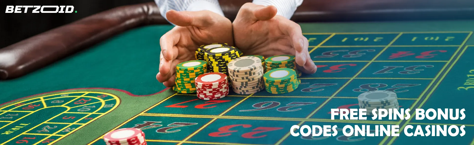 A player is holding a pile of chips on a casino table.