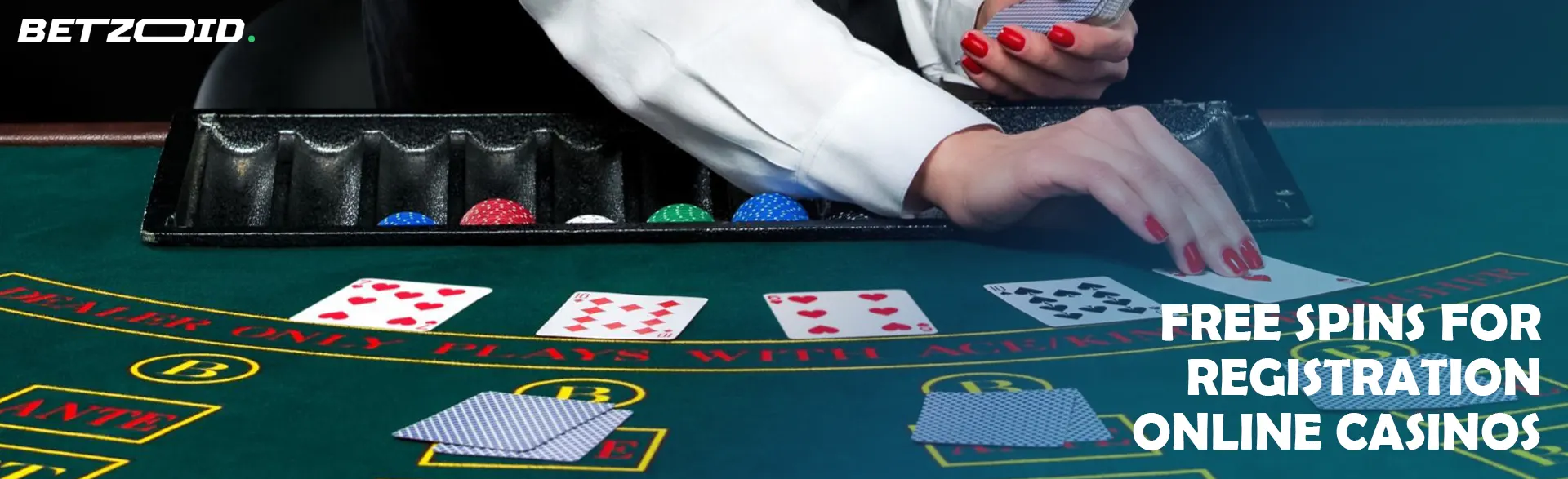The croupier lays out the cards on the casino table.