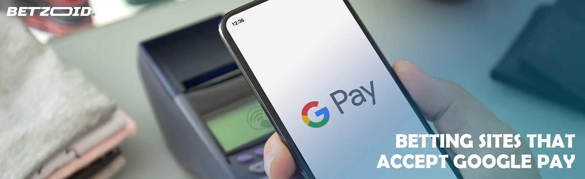A smartphone with the Google Pay logo above the terminal.