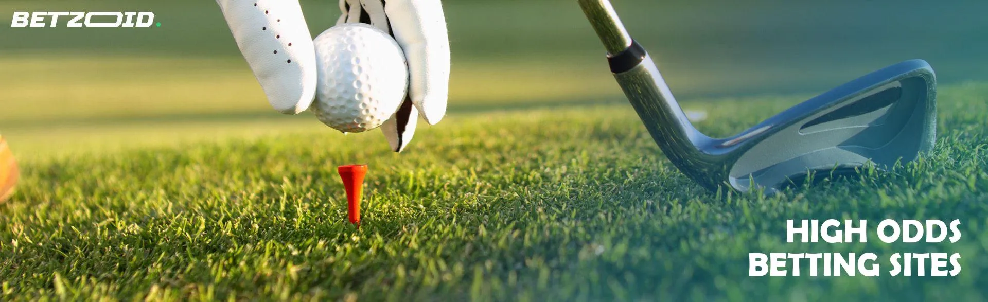 A golfer puts the ball up for a shot.