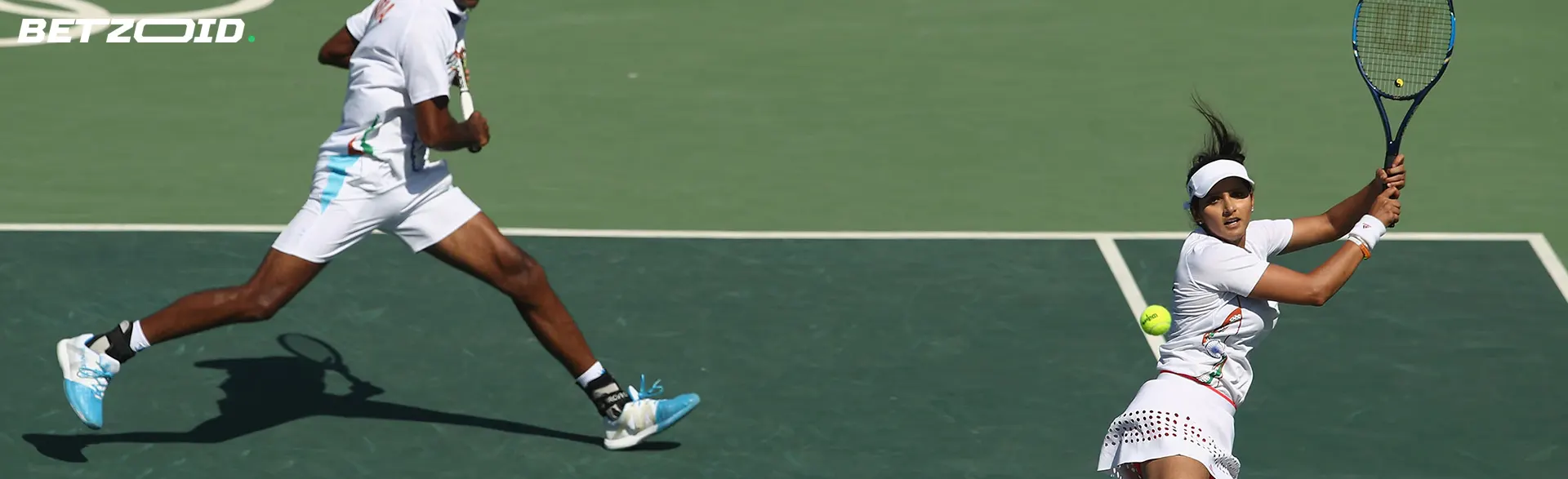 Tennis players in action during a match.