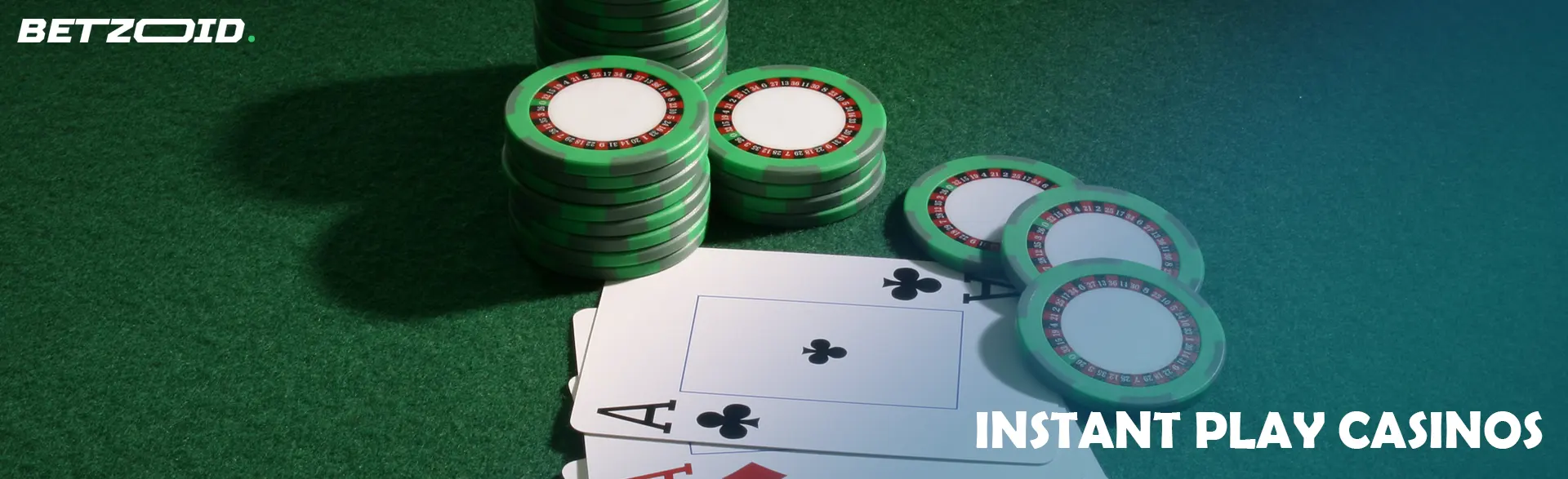 Cards and chips on a green background.