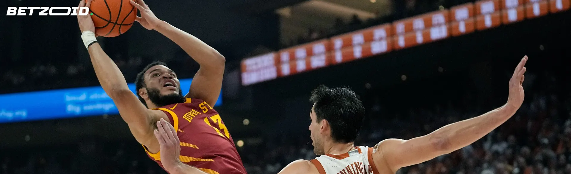 Basketball players in action during the game.