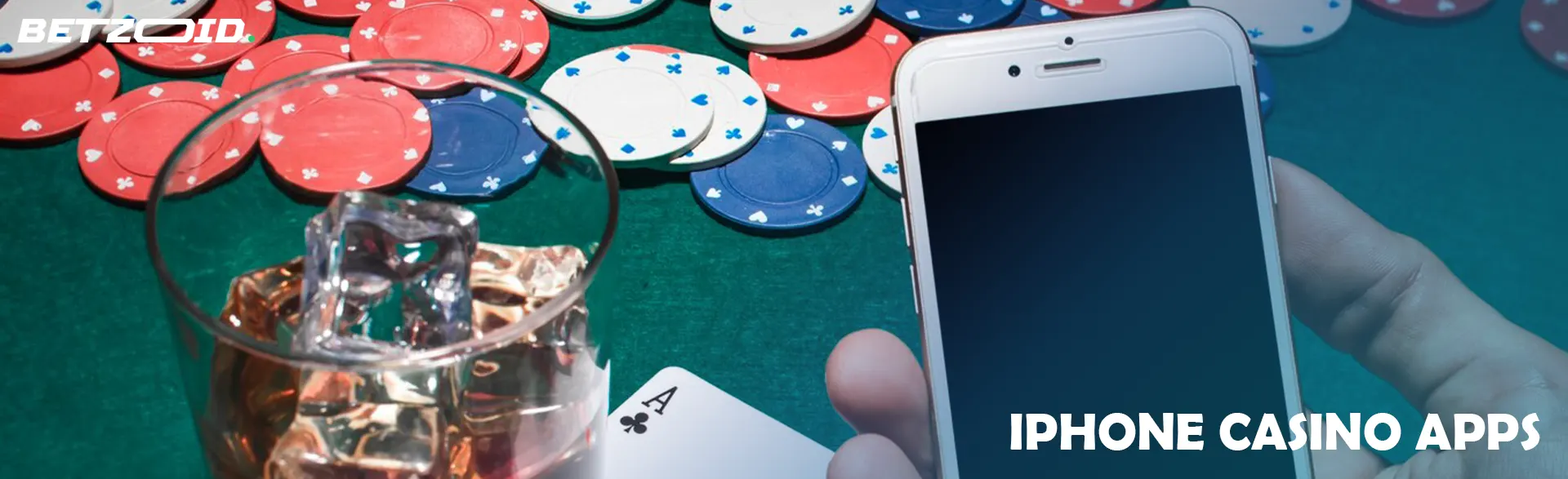 A smartphone next to chips and a drink in a glass.