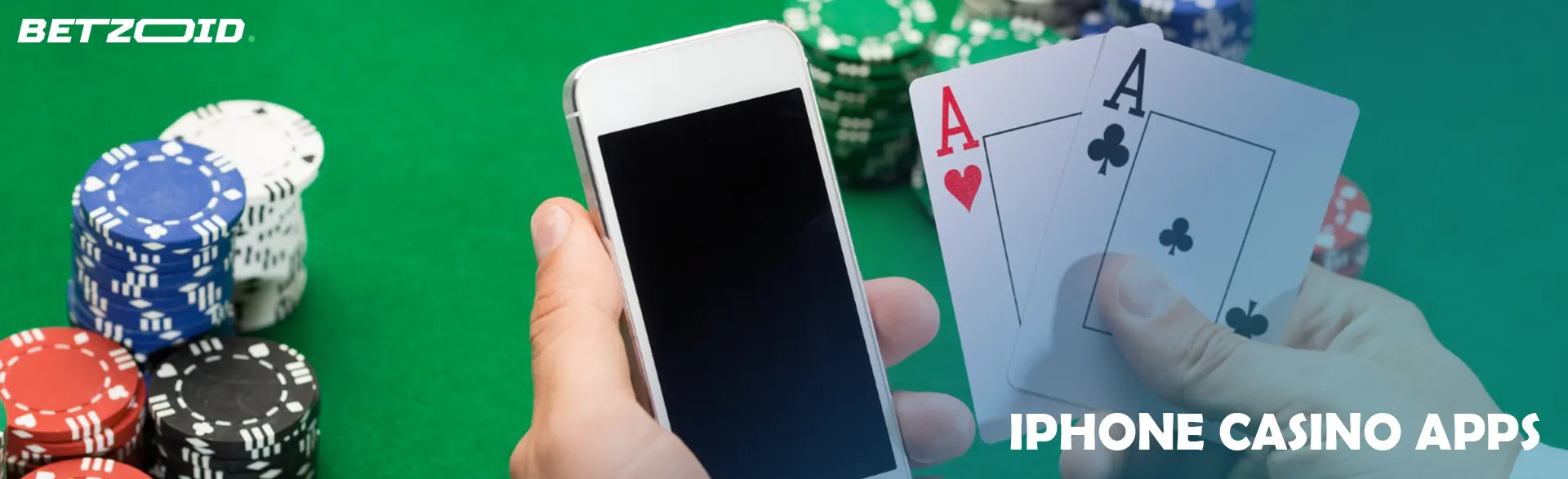 A player holds cards and an iPhone against a background of casino chips.